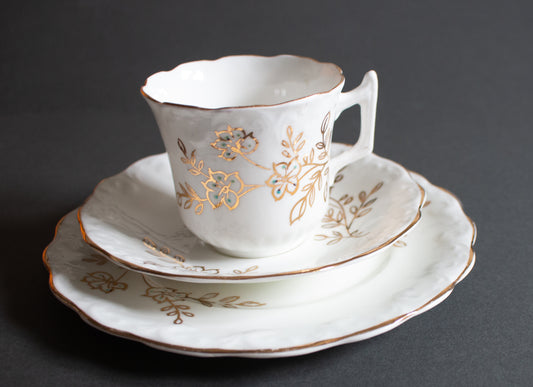 Vintage White and Gold Floral Teacup Trio