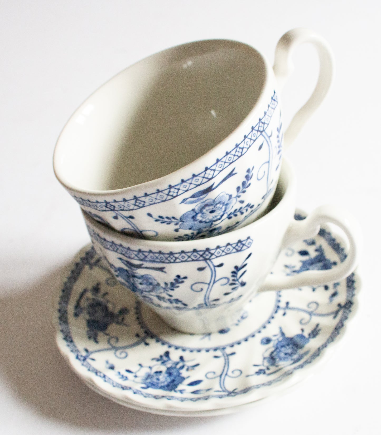 Johnson Brothers 'Indies' Blue and White Transferware Teacups and Sacuers (2)