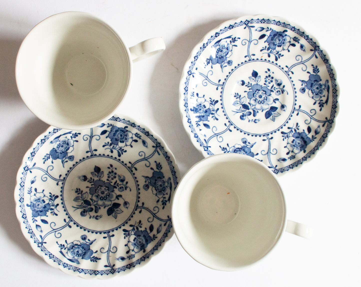 Johnson Brothers 'Indies' Blue and White Transferware Teacups and Sacuers (2)