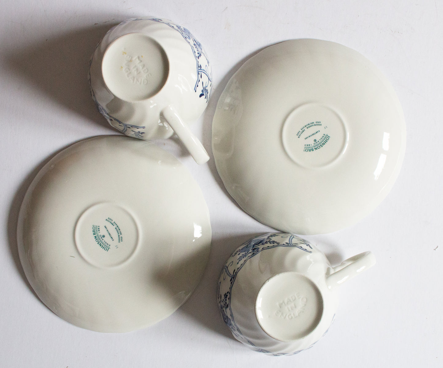 Johnson Brothers 'Indies' Blue and White Transferware Teacups and Sacuers (2)