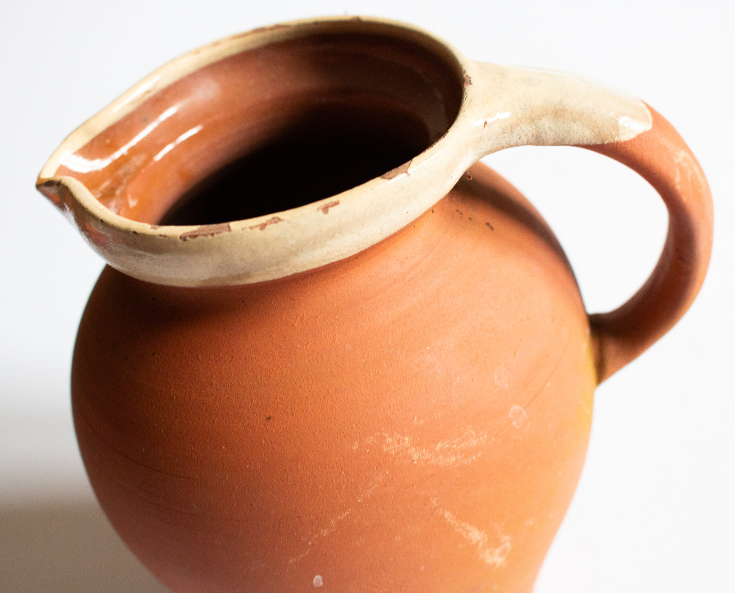 Antique West Country Terracotta Jug or Pitcher with Cream Lip and Glazed Interior