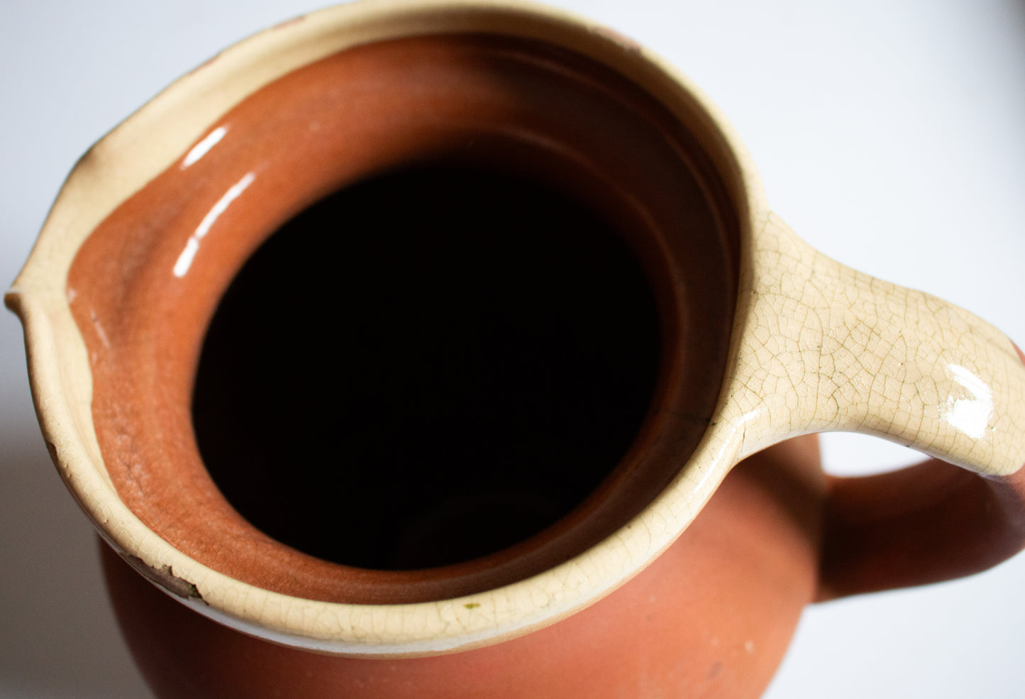 Large Antique West Country Terracotta Jug or Pitcher with Cream Lip and Glazed Interior