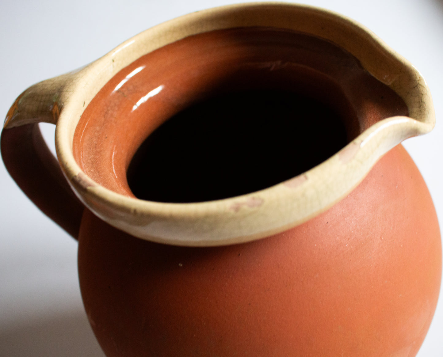 Large Antique West Country Terracotta Jug or Pitcher with Cream Lip and Glazed Interior