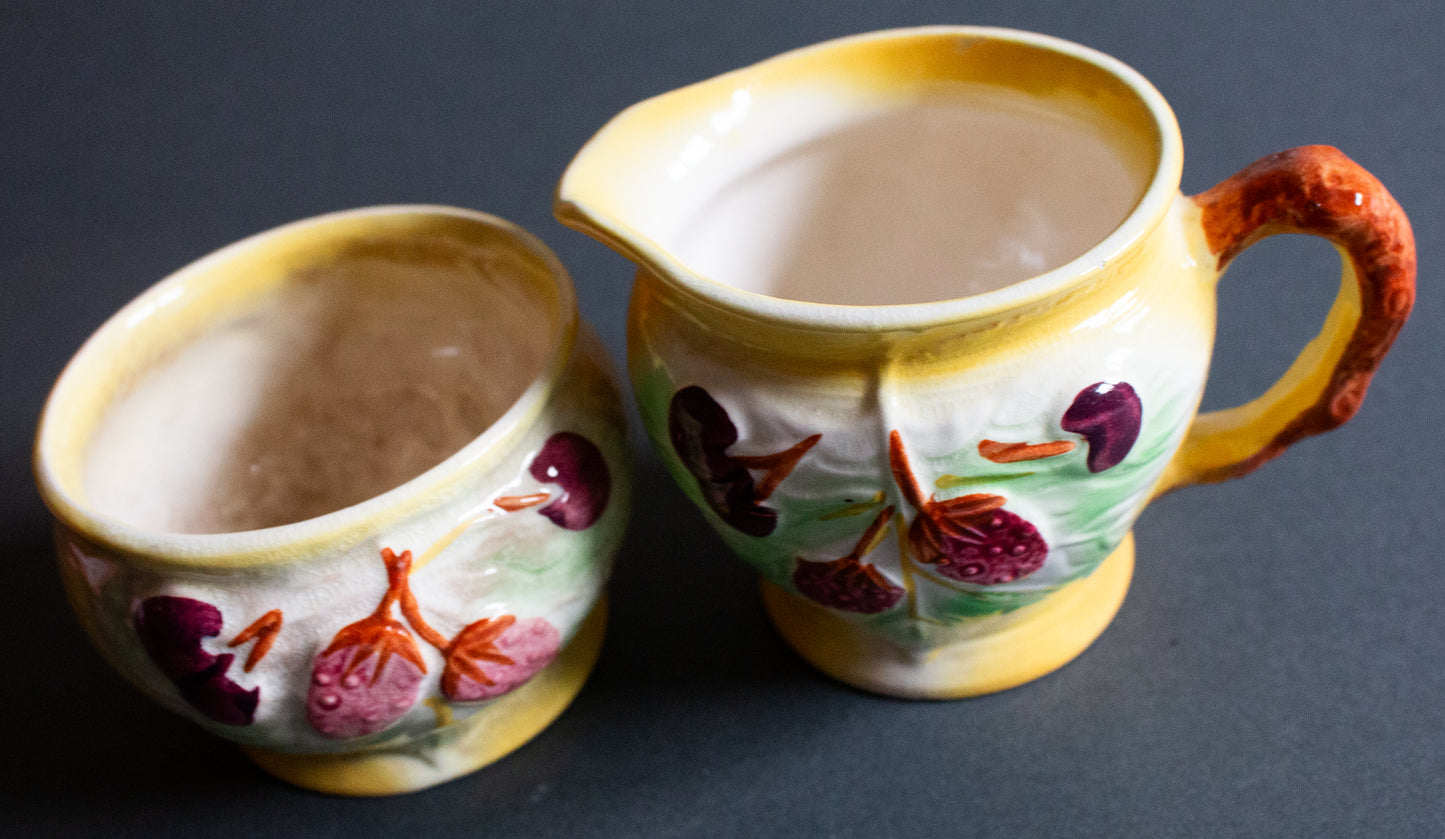 Avon Ware Yellow Sugar Bowl and Creamer Set with Moulded Fruit Detail