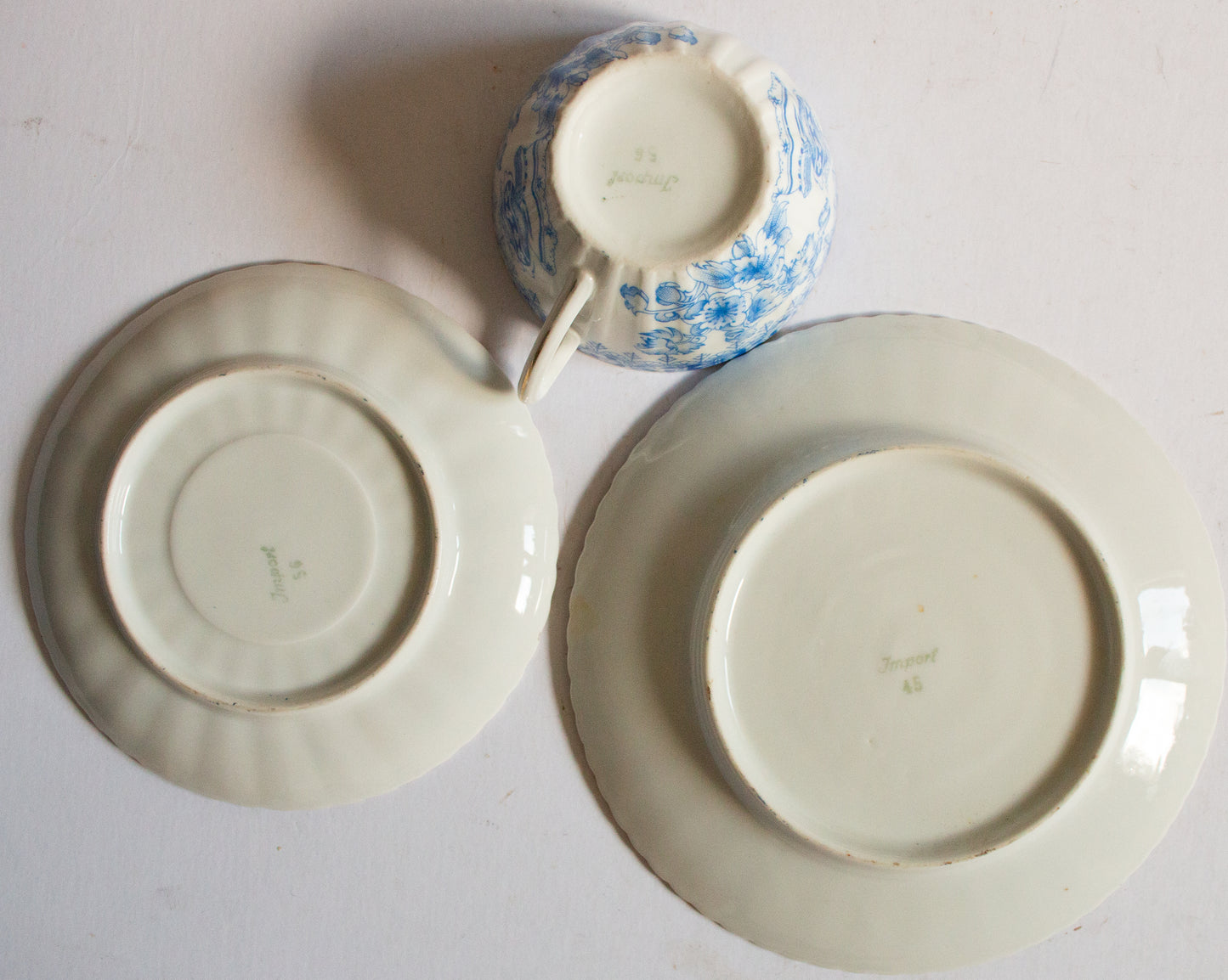 Vintage Blue and White China Teacup Trio with Floral and Gilt Detail