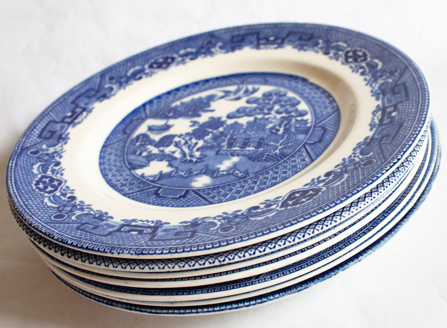 Vintage Mismatched Blue and White Transferware 'Old Willow Pattern' 8" Plates (7)