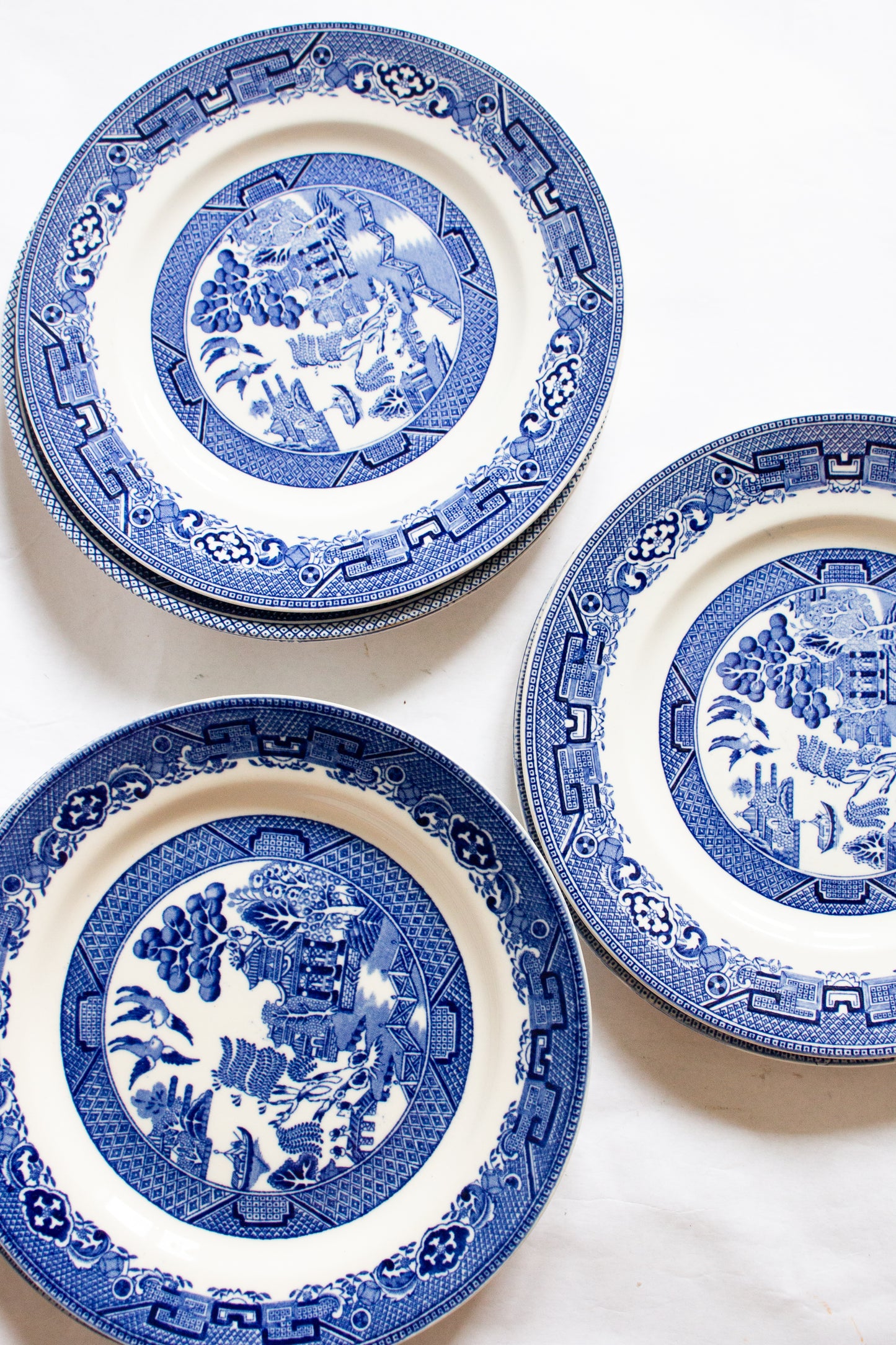 Vintage Mismatched Blue and White Transferware 'Old Willow Pattern' 8" Plates (7)