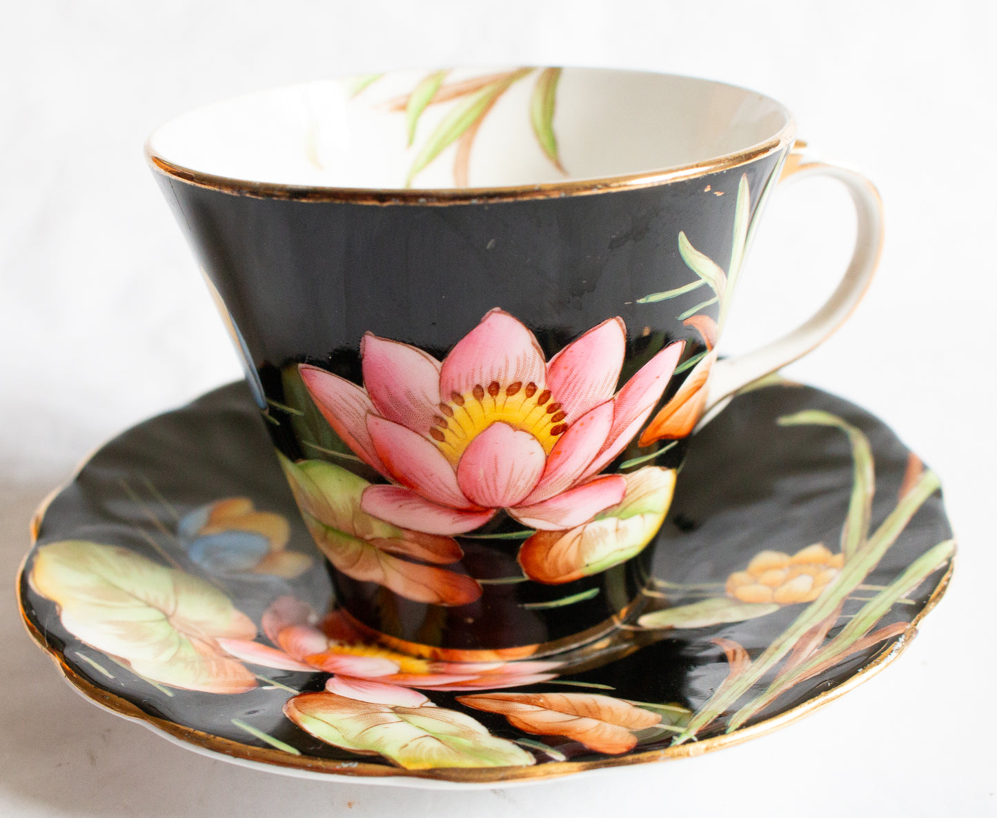 Aynsley Bone China Black and Gold Coffee Cup and Saucer with Handpainted Water Lily Detail