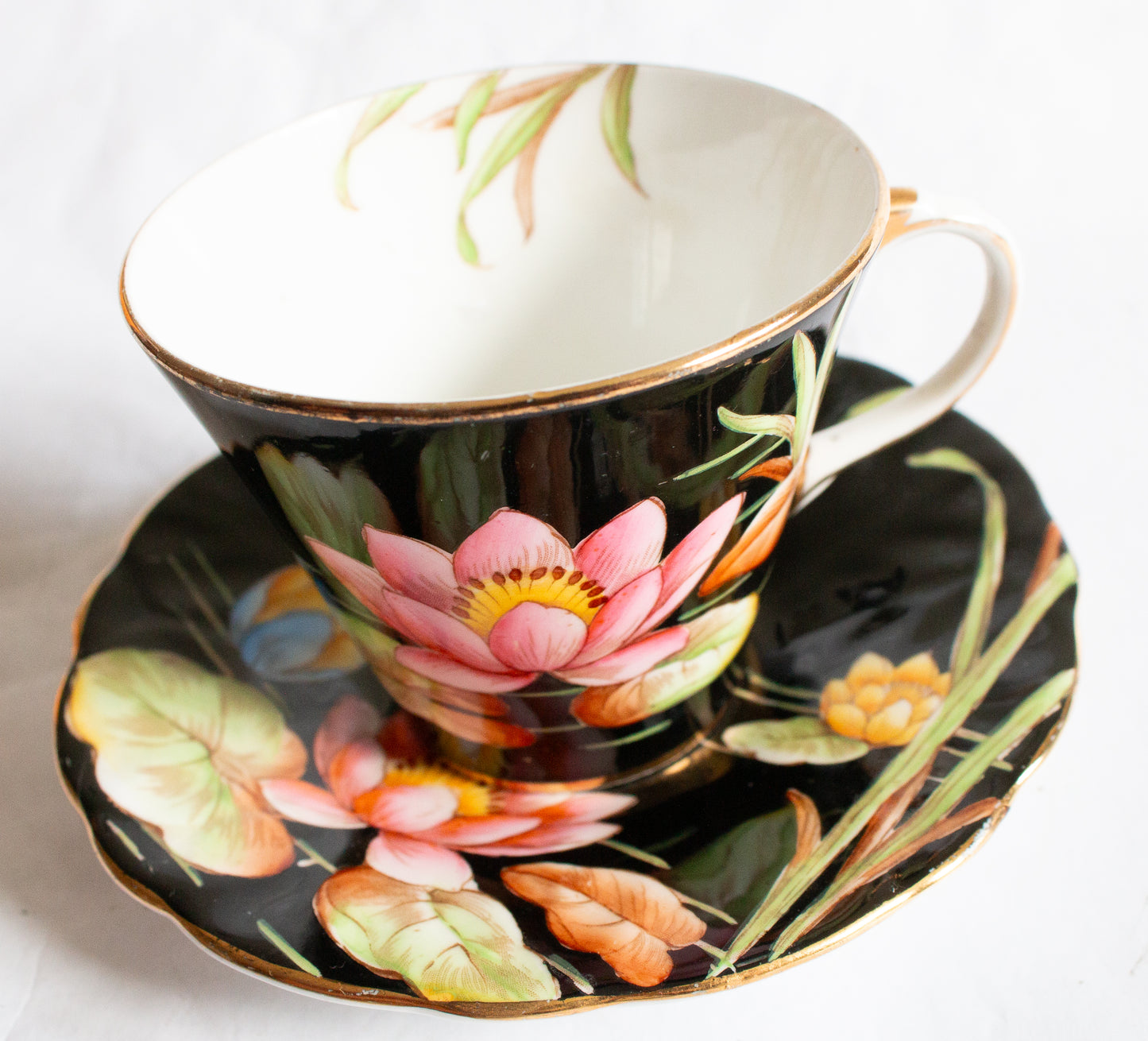 Aynsley Bone China Black and Gold Coffee Cup and Saucer with Handpainted Water Lily Detail