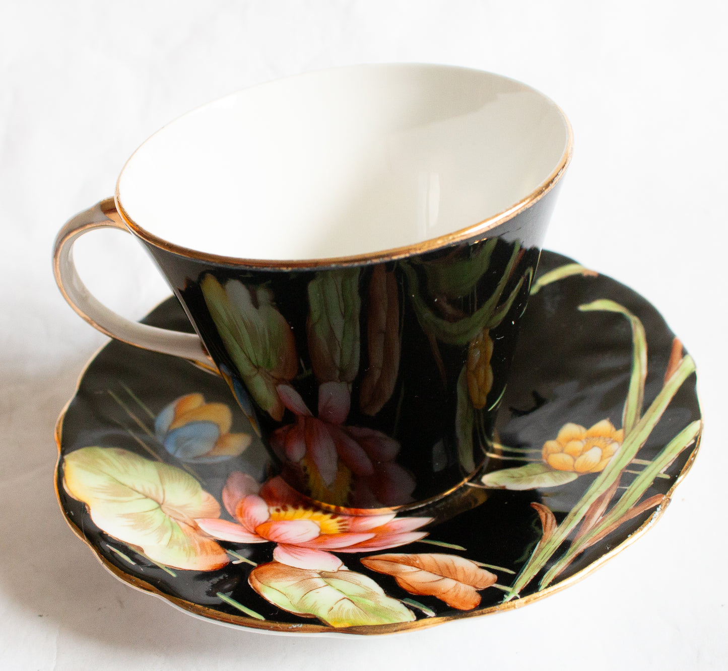 Aynsley Bone China Black and Gold Coffee Cup and Saucer with Handpainted Water Lily Detail