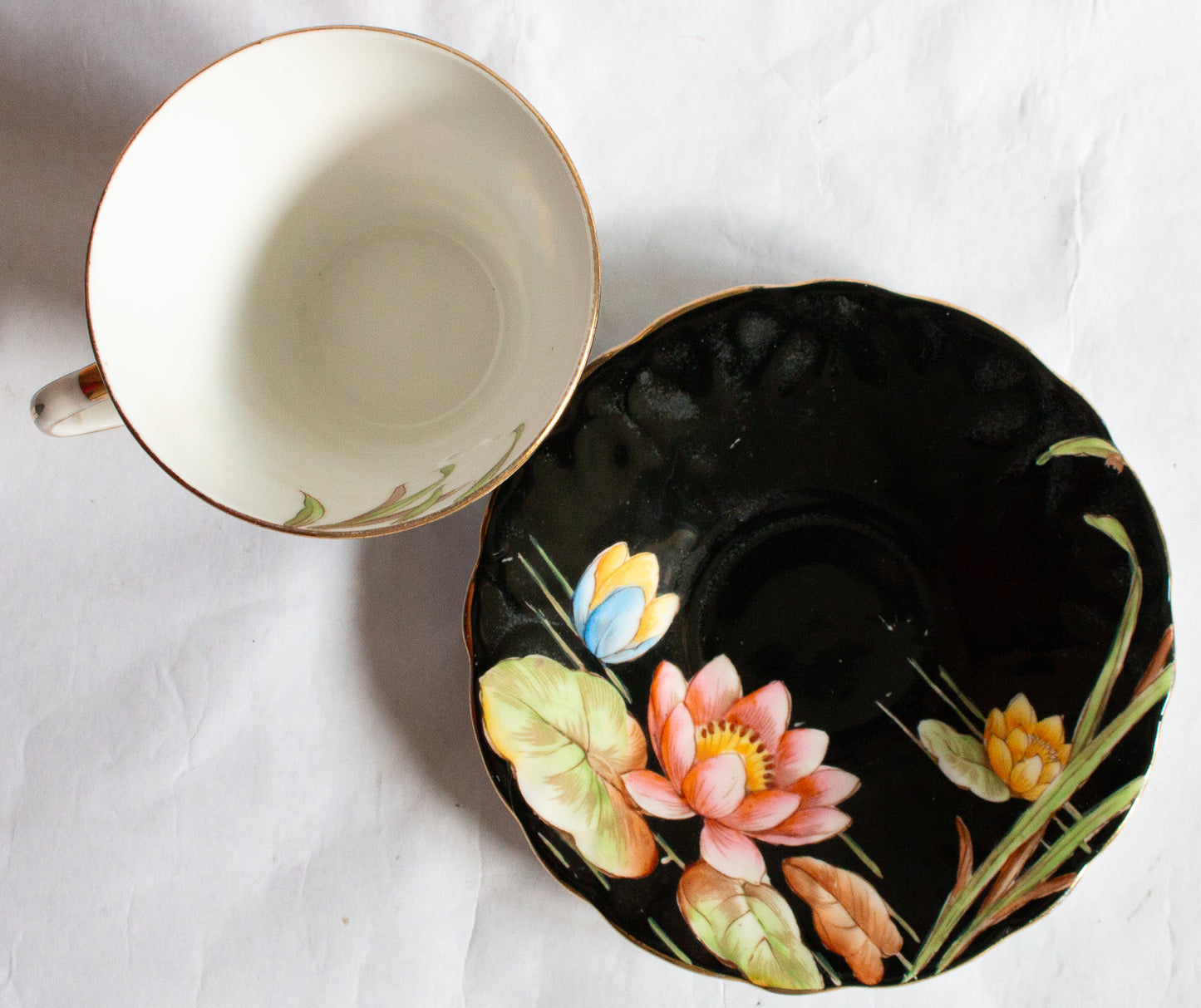 Aynsley Bone China Black and Gold Coffee Cup and Saucer with Handpainted Water Lily Detail