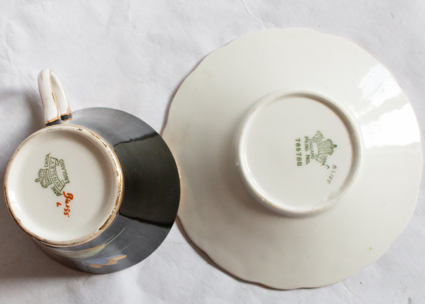 Aynsley Bone China Black and Gold Coffee Cup and Saucer with Handpainted Water Lily Detail