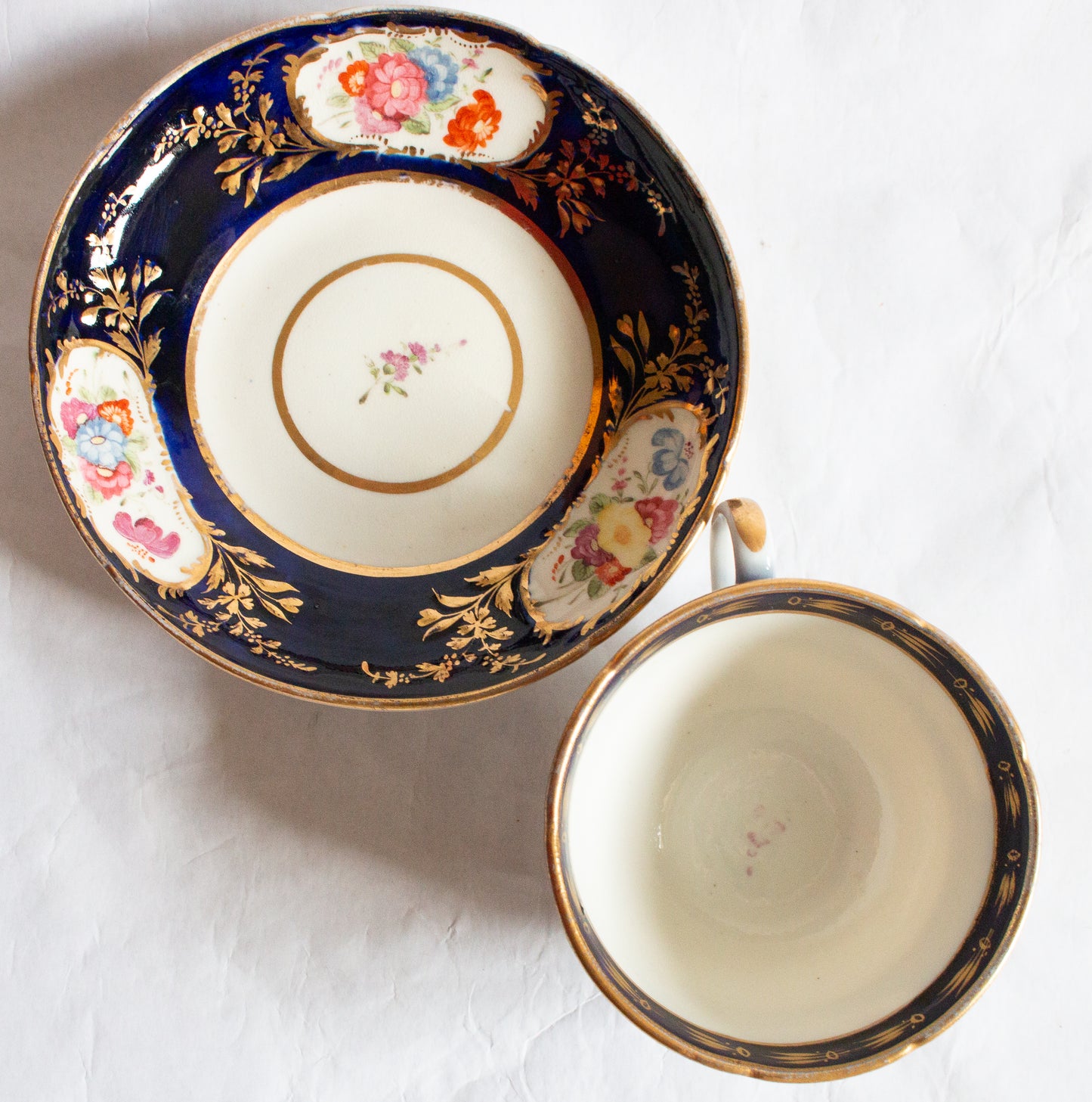 Antique Cobalt and Gold Bone China Teacup and Saucer with Hand painted Floral Detail