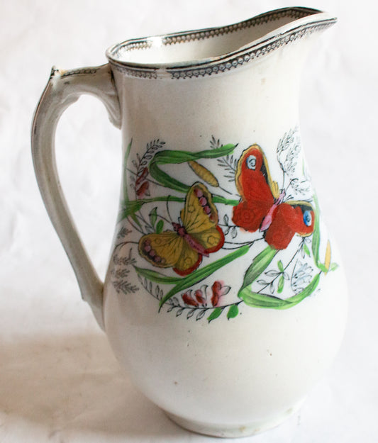 Antique Jug with Butterflies Detail