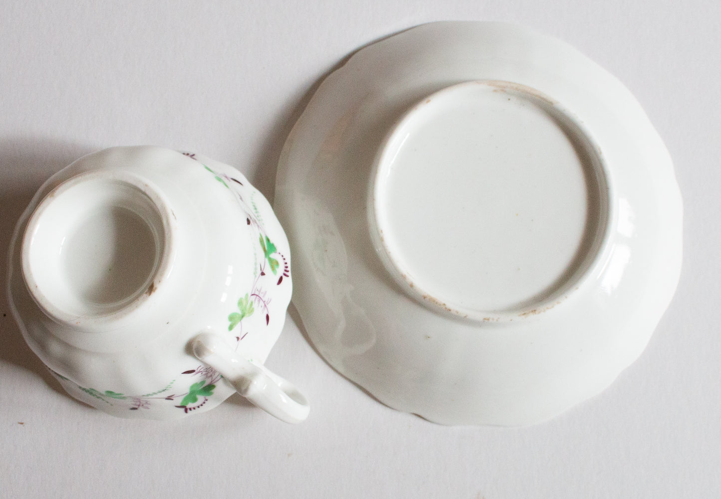 Antique Purple and Green Floral Motif Teacup and Saucer