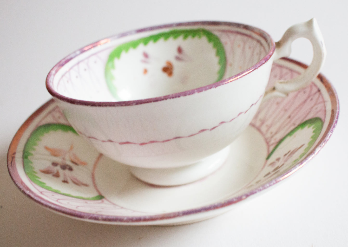 Antique Pink and Green Lustre Teacup and Saucer