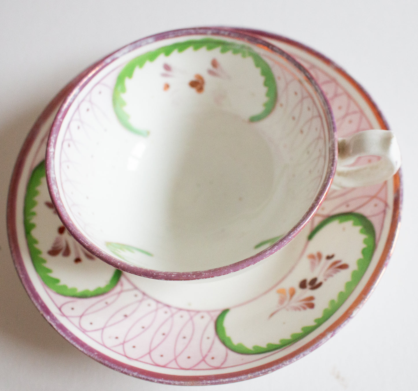 Antique Pink and Green Lustre Teacup and Saucer