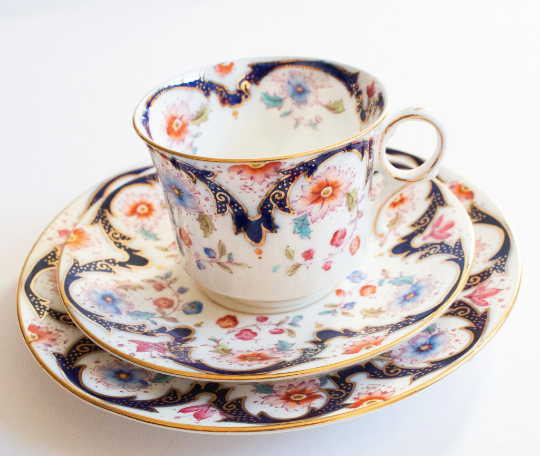 Blythe Porcelain Co. Ltd. Diamond China Teacup Trio with Floral and Gilt Detail