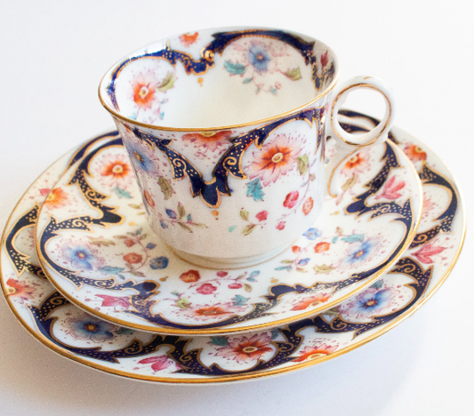 Blythe Porcelain Co. Ltd. Diamond China Teacup Trio with Floral and Gilt Detail