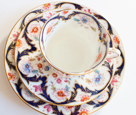 Blythe Porcelain Co. Ltd. Diamond China Teacup Trio with Floral and Gilt Detail